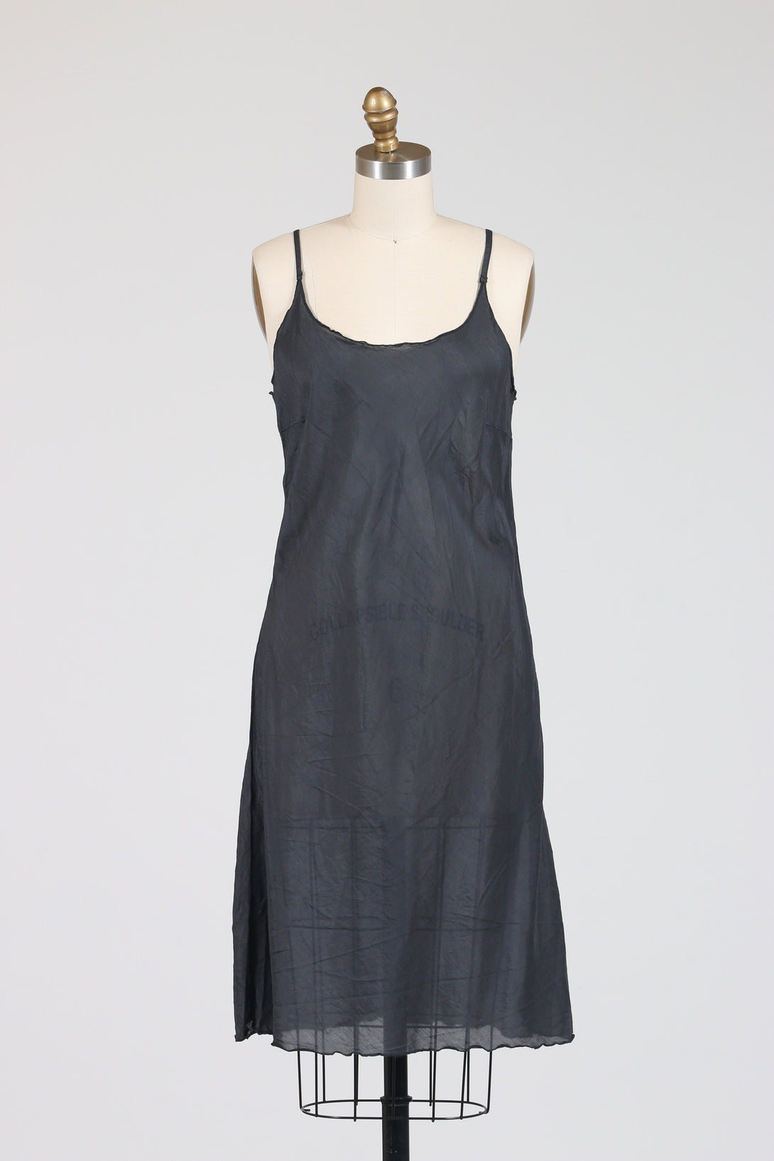 CP Shades Faye Slip is a slip dress made out of bias cut cotton-silk.