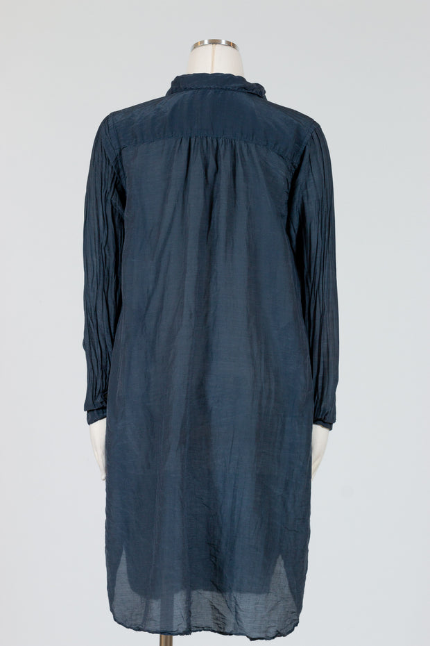 CP Shades Lara Dress is a long-sleeved open v-neck artist smock style dress that is comfortable and stylish. 