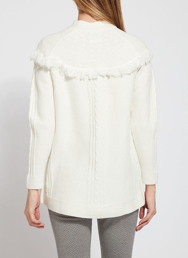 LYSSÉ Getaway Sweater is cable knit with a funnel neck and fringe accents it is stretchy and comfortable and so easy to wear to give your outfit a real dose of style.
