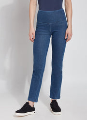 LYSSÉ Denim Straight Leg Jean is a full length high waisted stretch denim knit pant with a concealed inner waistband made in a polyester blend that lends to a very slimming fit that hugs the body.