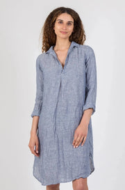 CP Shades Lara Dress is a long-sleeved, lightweight chambray linen and open v-neck artist smock style dress that is comfortable and stylish. 