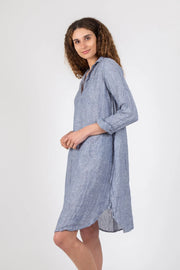 CP Shades Lara Dress is a long-sleeved, lightweight chambray linen and open v-neck artist smock style dress that is comfortable and stylish.